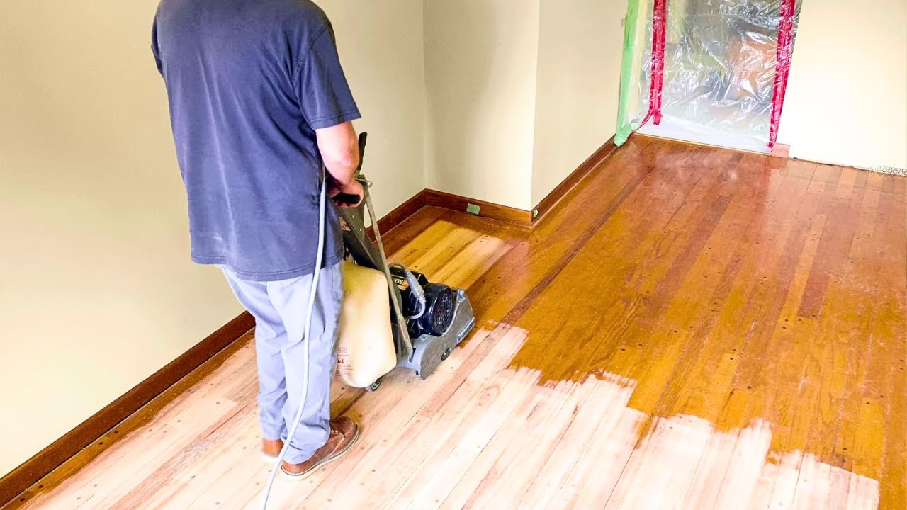 Hardwood floor restoration and refinishing after construction in Dallas